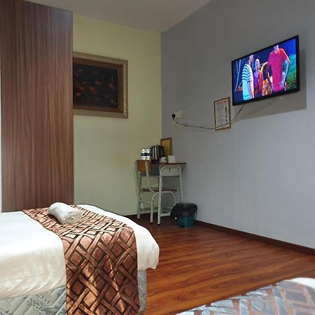 Oyo 90964 Melody 88 Inn Miri Extérieur photo