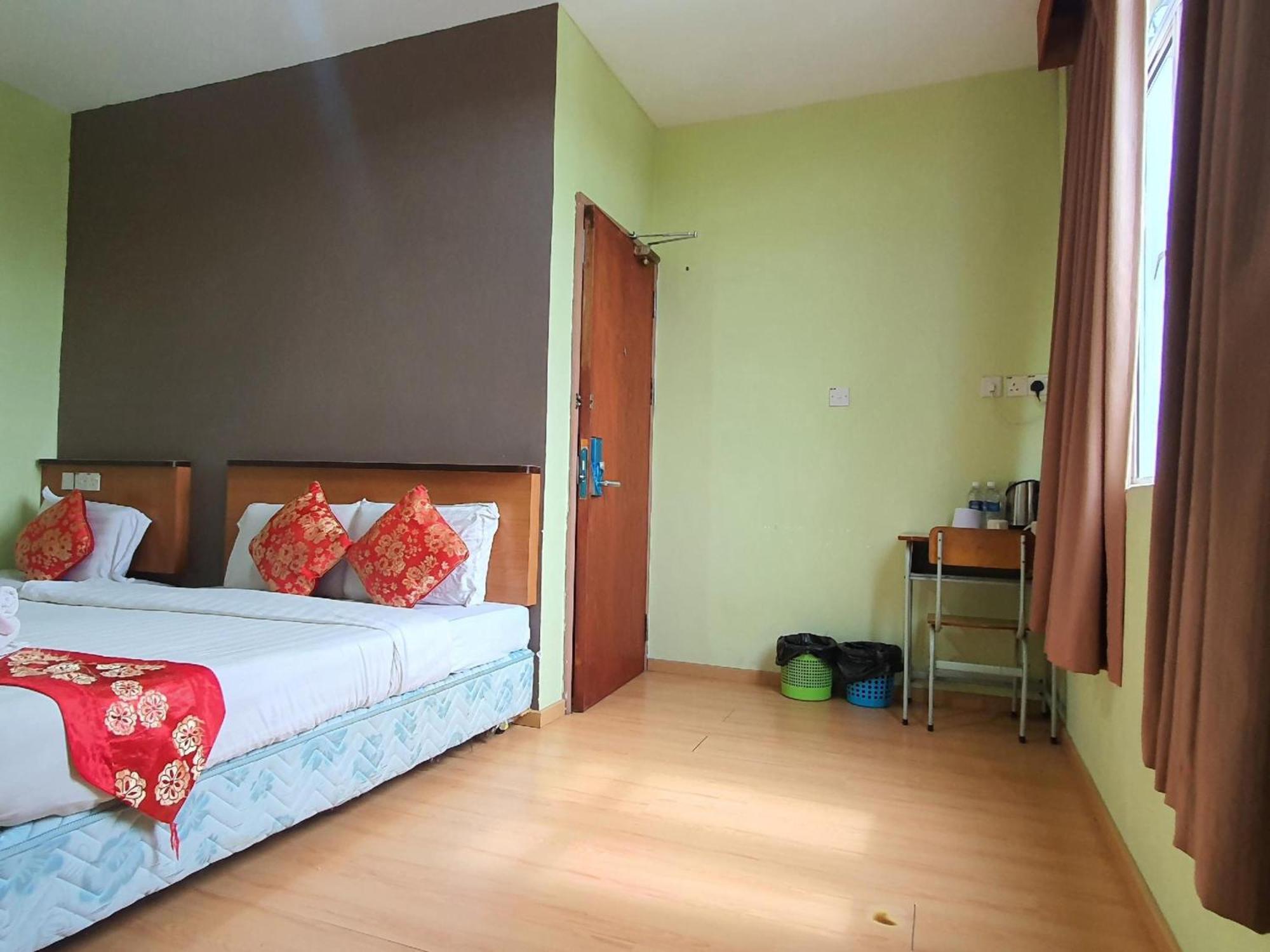 Oyo 90964 Melody 88 Inn Miri Extérieur photo